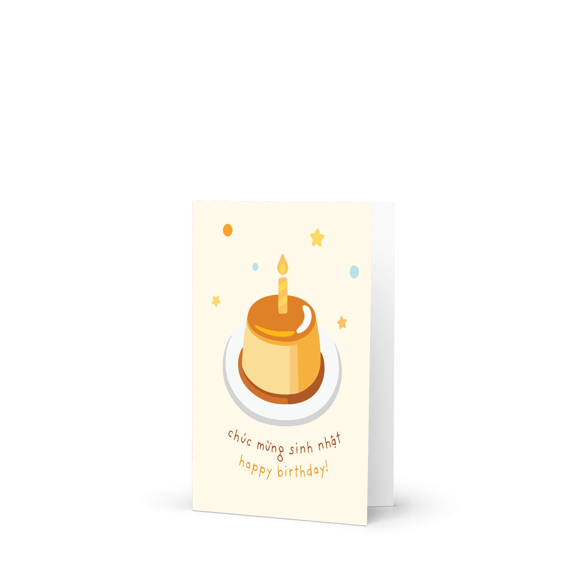 A vertical Vietnamese birthday card with a cream-colored background featuring a cute illustration of a birthday cake with a candle, surrounded by small stars and dots. Below the illustration, the Vietnamese text 'chúc mừng sinh nhật' and 'happy birthday!' are written in brown and yellow fonts.