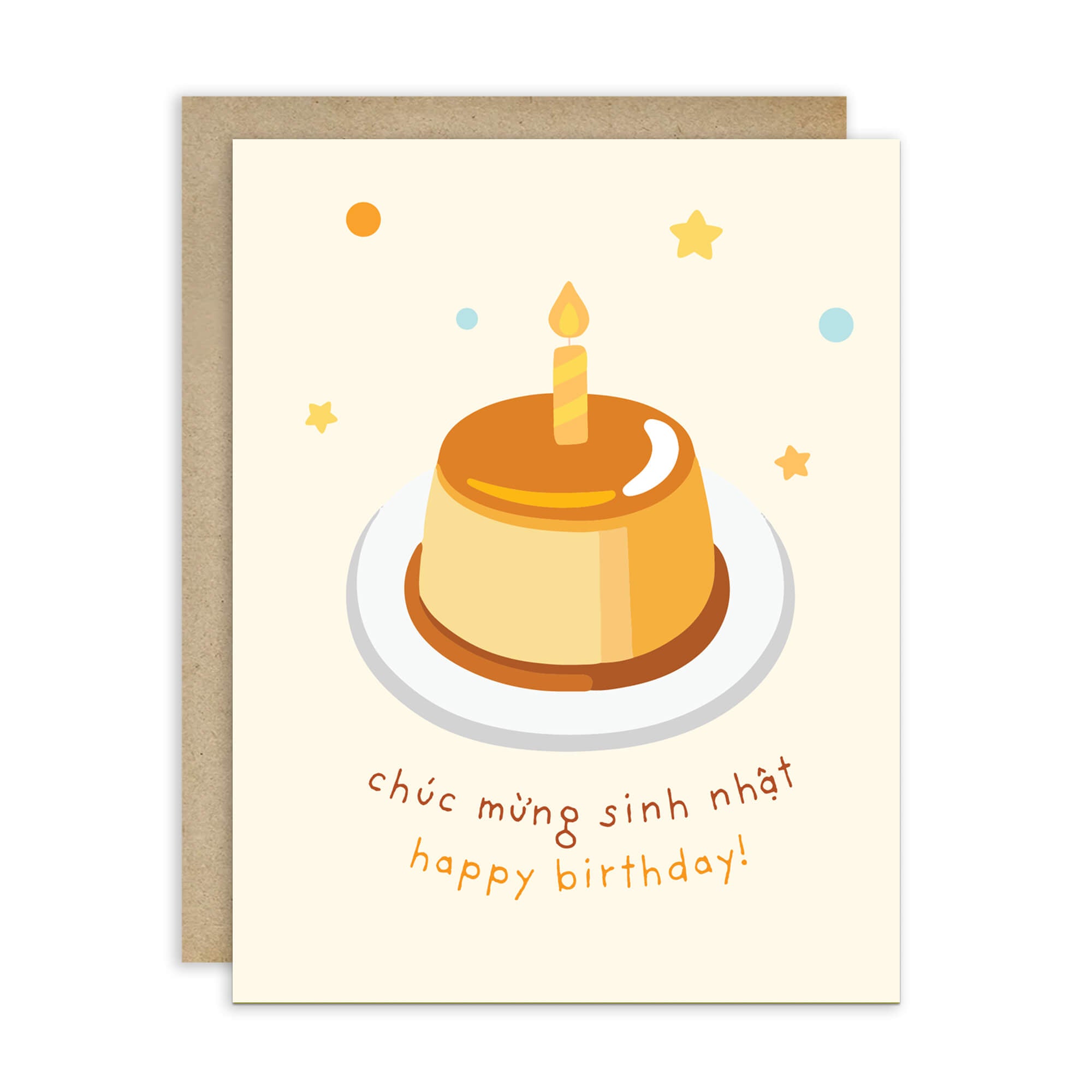 A Vietnamese birthday card with a kraft envelope, featuring an illustration of a caramel-colored flan or custard dessert on a white plate with a single candle, surrounded by small stars and dots, with the text 'Đơch mưng sinh nhát happy birthday!' in brown and orange lettering.