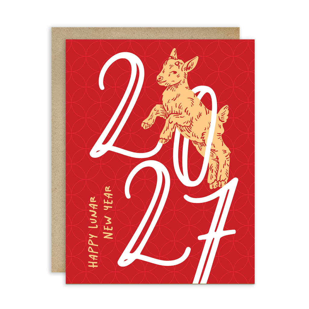 A red chinese new Year greeting card with a kraft envelope behind it. The card features a gold goat illustration and large white '2027' numerals, with 'HAPPY LUNAR NEW YEAR' printed vertically on the left.